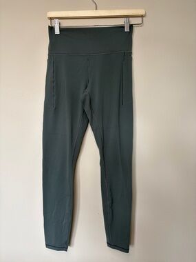 Women’s Athleta  transcend stash Performance Leggings in green moss Medium